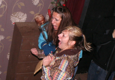 Photograph of two scared girls