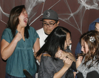 Photograph of two scared girls